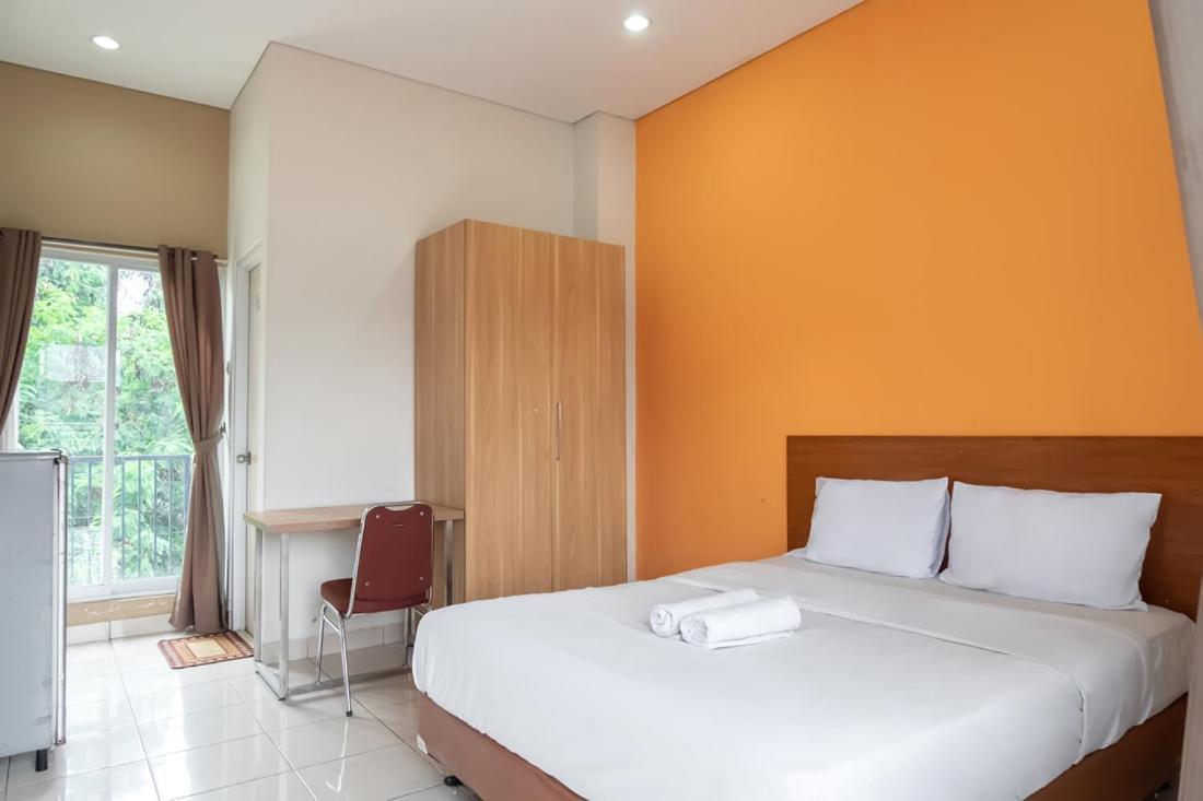 Gasthuis Twospaces Living At Kost 40, Kuningan